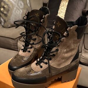 100% authentic Louis Vuitton boots.  No receipt but PM can authenticate.